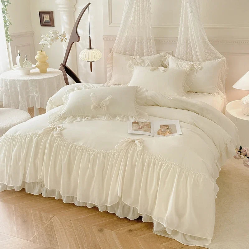 Three-piece white bedding set with ruffled duvet cover from MC The Black Diamonds, featuring soft, elegant bedsheets with decorative ruffles.