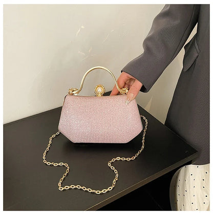 Black solid color MC The Black Diamonds women’s hand bag with chain strap and simple crossbody style, featuring hasp closure.