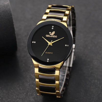 Pair of MC The Black Diamonds his and hers matching watches with black bands and diamond accents, displayed side by side.