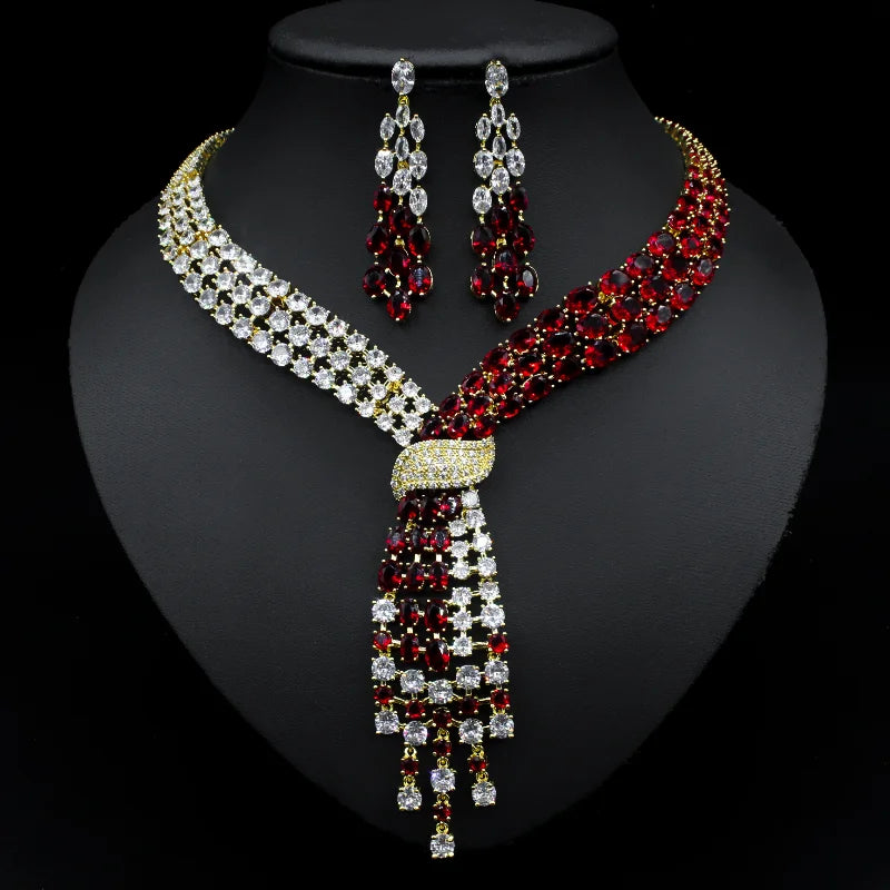 Handmade Lab Emerald and Diamond jewelry set with 14K white gold wedding rings, earrings, and necklace for women bridal and engagement.