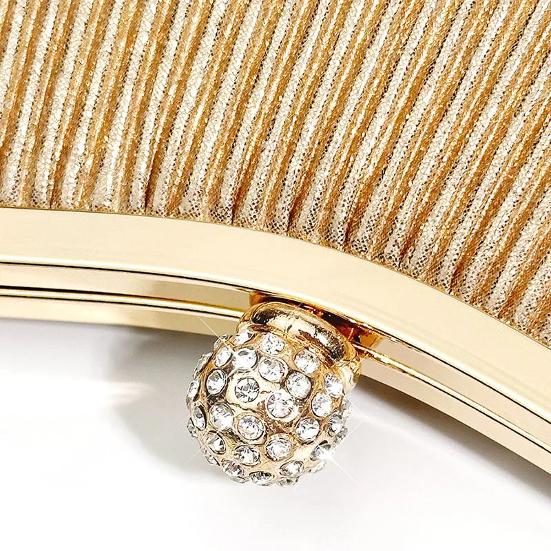Gold MC THE BLACK DIAMOND pleated evening clutch handbag with diamond accents, top handle, perfect for wedding and party occasions.