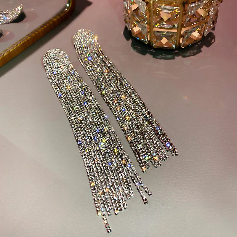 MC THE BLACK DIAMOND long tassel rhinestone drop earrings with oversized crystal dangles for women, fashionable jewelry accessories.