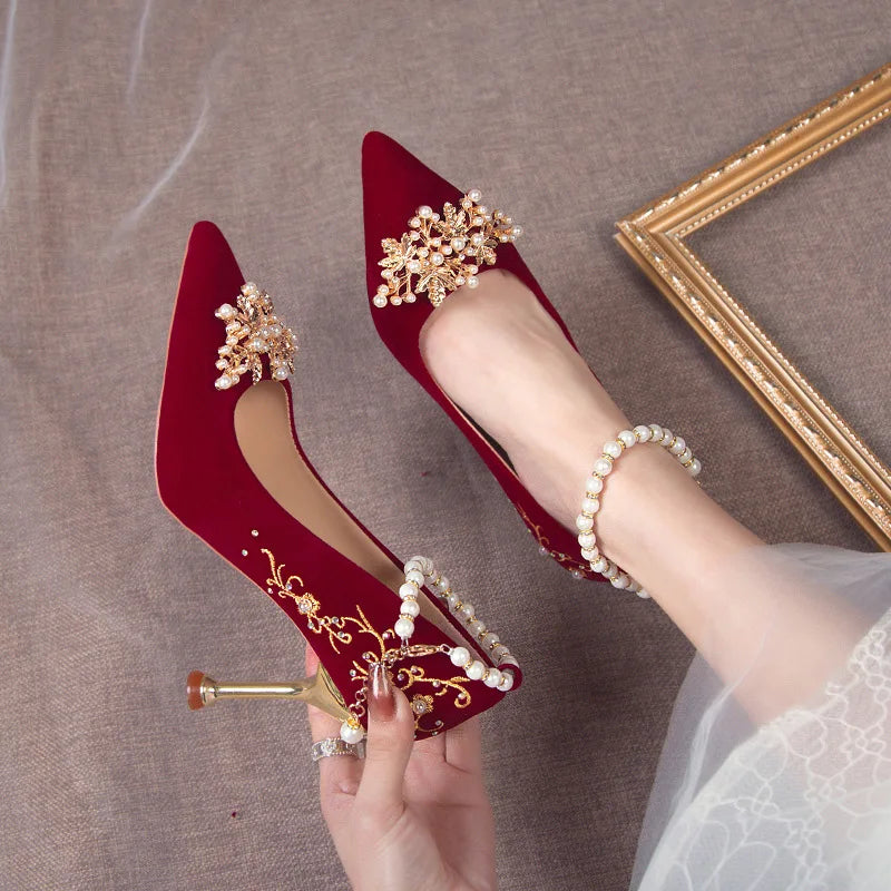 Women’s red high heel shoes by Mohammad Collection with pointed toes, elegant design, water diamonds, perfect for weddings and banquets.
