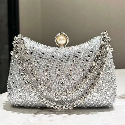 MC THE BLACK DIAMOND evening clutch bag with rhinestone diamond inlay, gold and silver finish, perfect for weddings and parties.