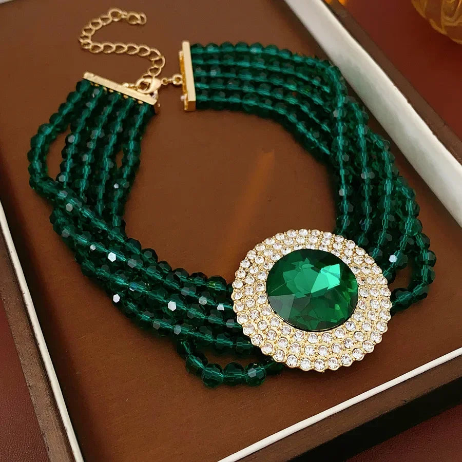 Green glass jewelry set with inlaid rhinestones, featuring a necklace and earrings, elegant wedding accessory by MC THE BLACK DIAMOND