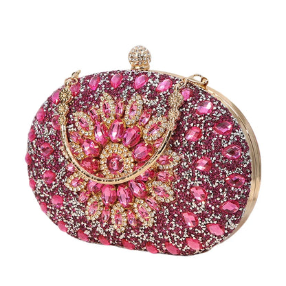Luxury diamond women’s clutch evening bag by MC THE BLACK DIAMOND, featuring elegant design and sparkling accents.