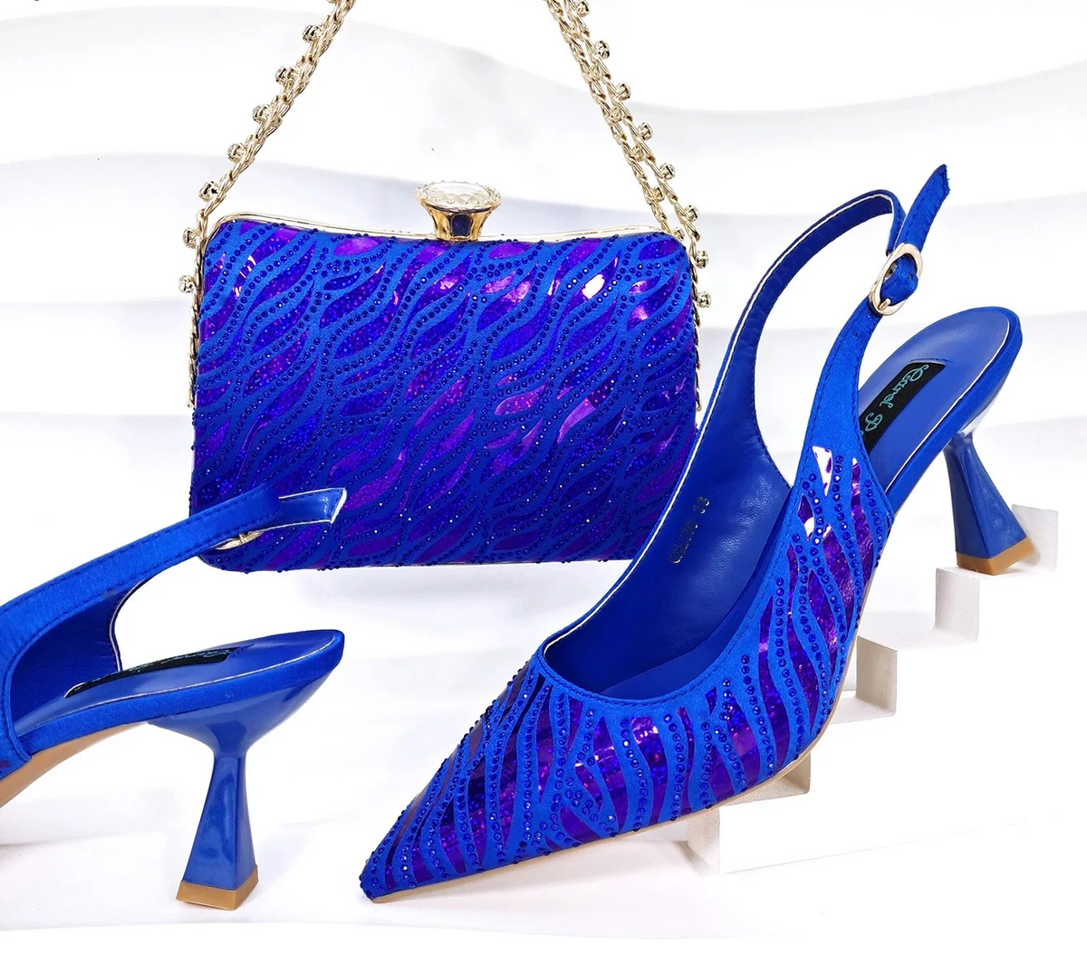 MC THE BLACK DIAMOND Nigerian style women heels with pointed toes and shiny clutch for party occasions.