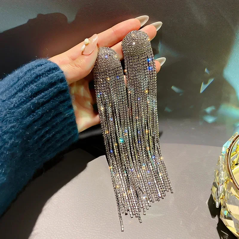 MC THE BLACK DIAMOND long tassel rhinestone drop earrings with crystal dangles and oversized design for women.