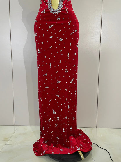 MC Sparkly Velvet Dress by MC THE BLACK DIAMOND, shown in a close-up of the shimmering, rich velvet fabric and elegant design.