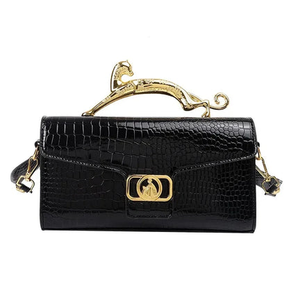 Women’s luxury MC THE BLACK DIAMOND leather handbag with metal buckle, stylish shoulder bag for parties and casual wear.