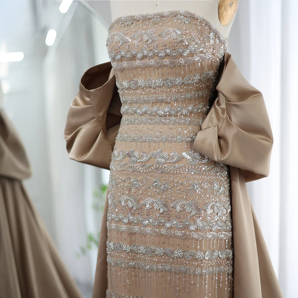Sage green evening dress by MC THE BLACK DIAMOND, MC BRAND, featuring elegant fabric and sophisticated design for formal occasions