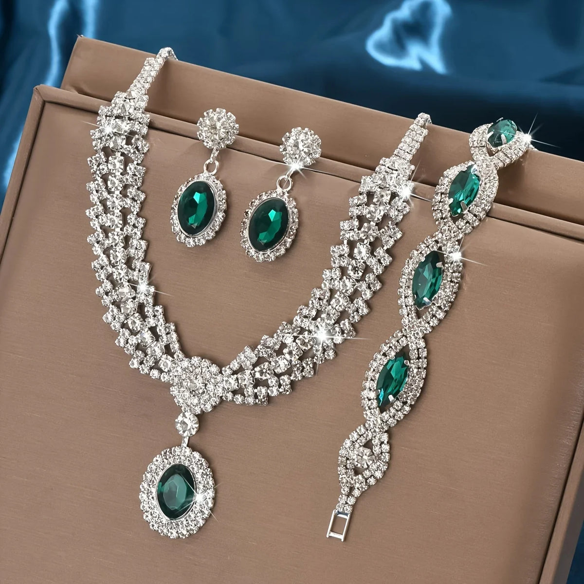 Elegant bridal jewelry set featuring a necklace and earrings with sparkling rhinestones by 𝕄𝕔 𝕋𝕙𝕖 𝔹𝕝𝕒𝕔𝕜 𝔻𝕚𝕒𝕞