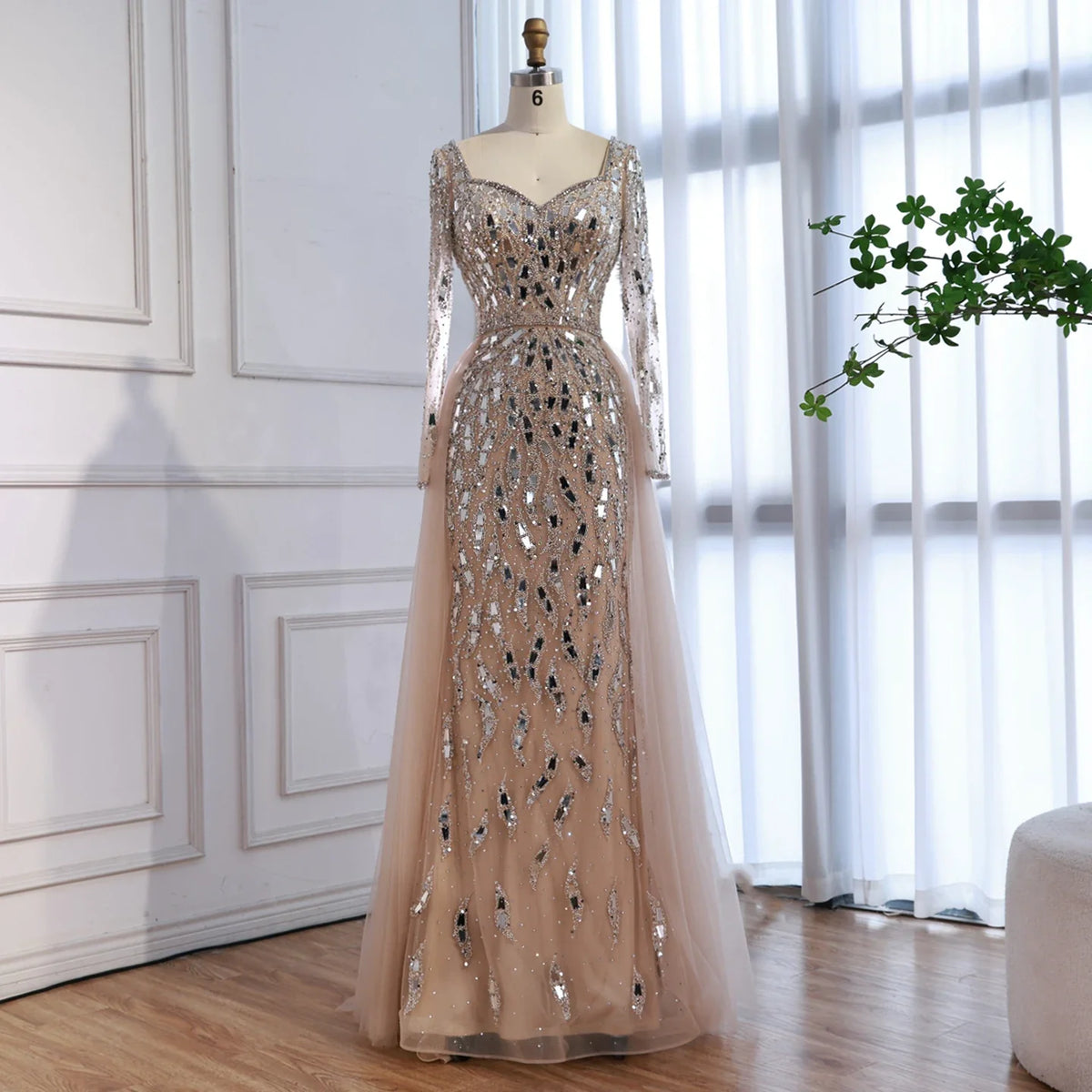 Elegant MC Luxury Arabic dress by MC THE BLACK DIAMOND featuring intricate embroidery and flowing fabric.