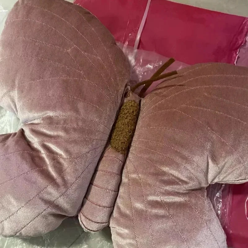 Pink Butterfly Cushion Throw Pillow by MC THE BLACK DIAMOND, decorative home decor accent with detailed butterfly design.