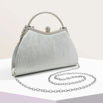 Gold MC THE BLACK DIAMOND pleated evening handbag with top handle, glitter finish, diamond accents, perfect for weddings and parties.
