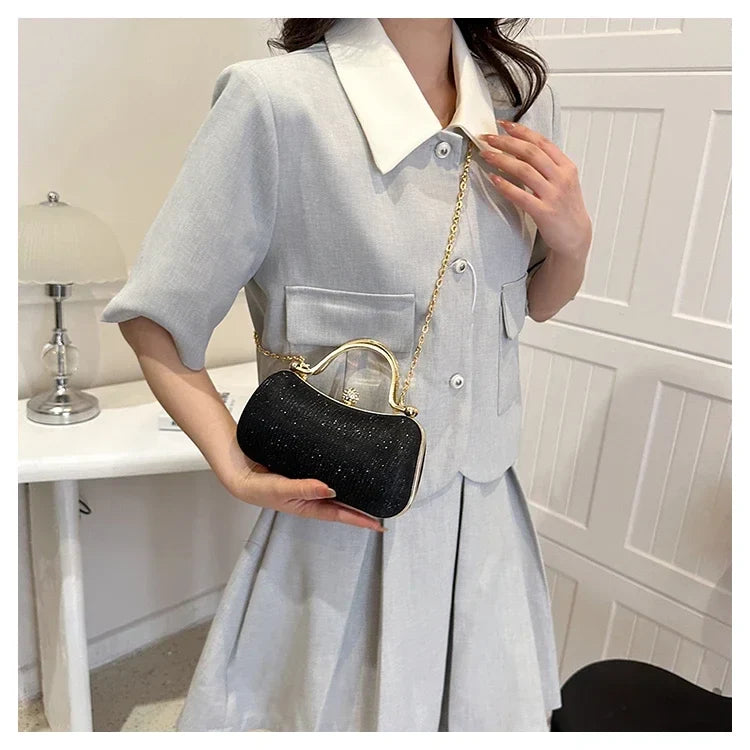 Black MC THE BLACK DIAMOND chain evening shoulder bag with elegant design, perfect for dinner and special occasions.
