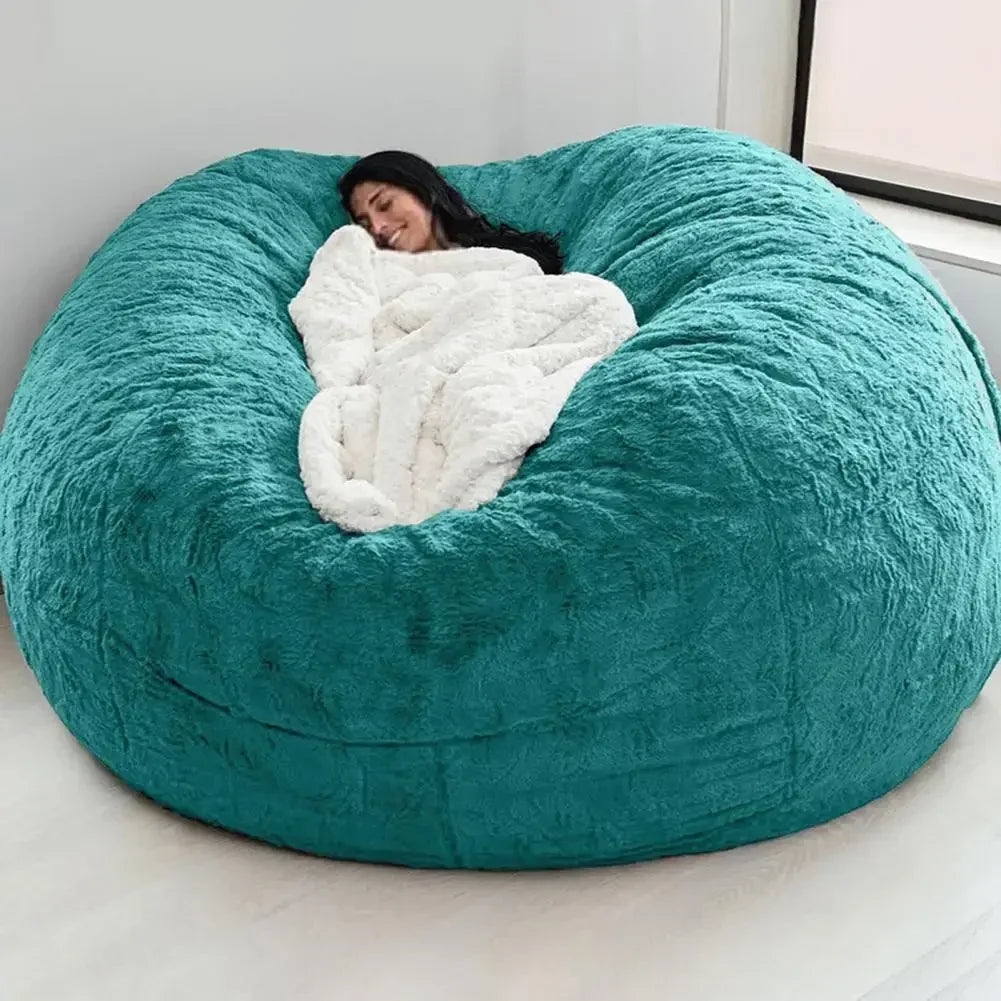 Black oversized bean bag chair cover by MC THE BLACK DIAMOND, made of durable fabric, shown on a bean bag chair.