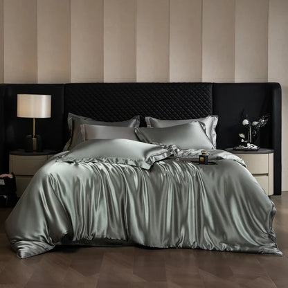 Luxurious silk bed sheets set with duvet cover, fitted sheet, flat sheet, and pillowcases in king and queen sizes from MC The Black Diamonds.