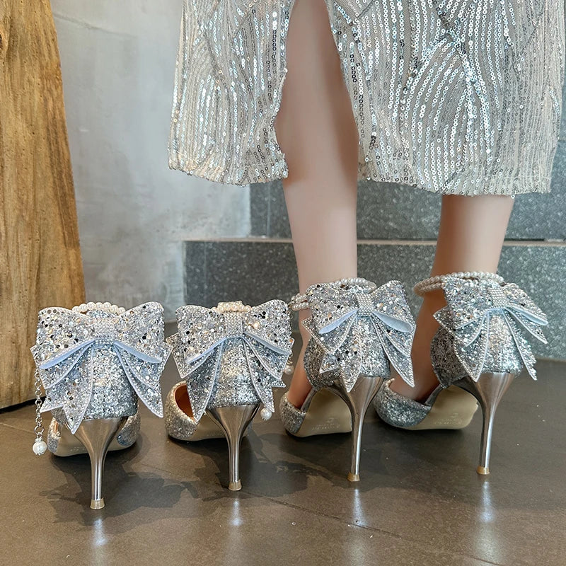Elegant French pointy high heels by Mohammad Collection featuring sequin bows, pearl accents, and a shallow mouth design.