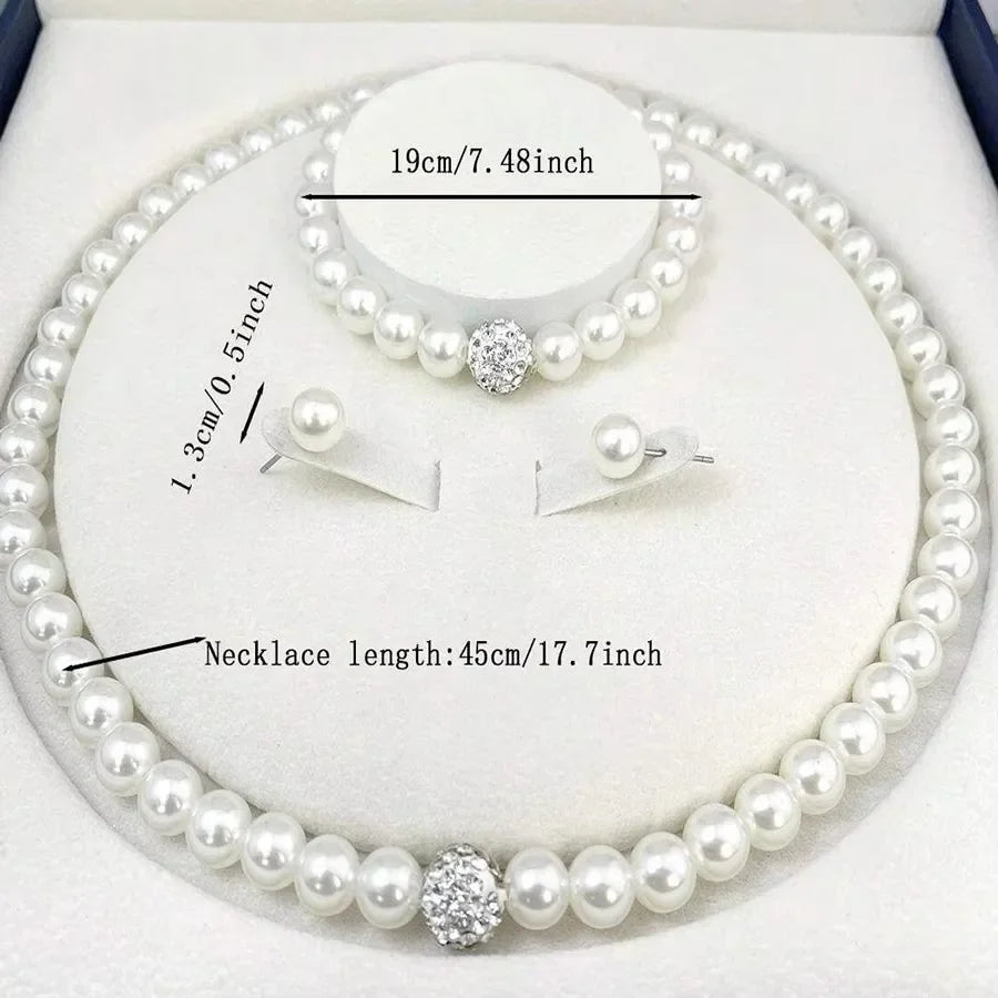 Elegant jewelry set featuring a necklace, bracelet, and earrings with black diamonds from 𝕄𝕔 𝕋𝕙𝕖 𝔹𝕝𝕒𝕔𝕜 𝔻𝕚𝕒�