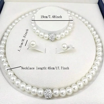 Elegant jewelry set featuring a necklace, bracelet, and earrings with black diamonds from 𝕄𝕔 𝕋𝕙𝕖 𝔹𝕝𝕒𝕔𝕜 𝔻𝕚𝕒�