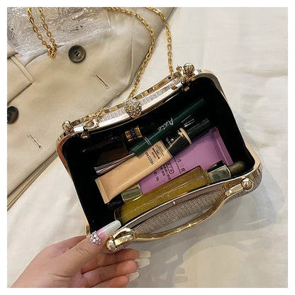 MC The Black Diamond chain evening shoulder bag for women, stylish black hand bag with a sleek design and chain strap.