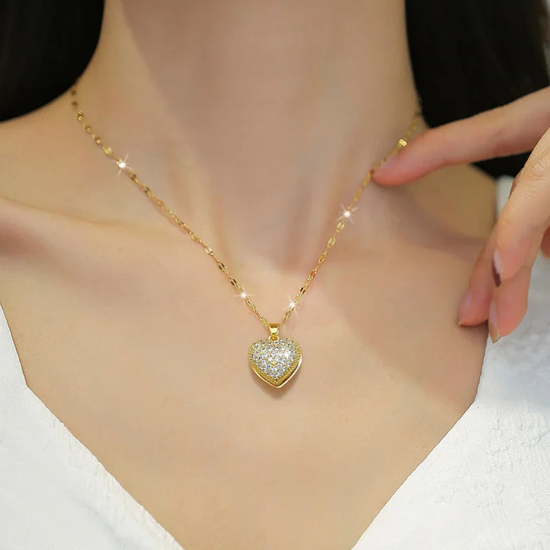 Gold-colored ZAKOL French shell pearl necklace with zircon accents, love heart charm, stainless steel chain, perfect for wedding jewelry.
