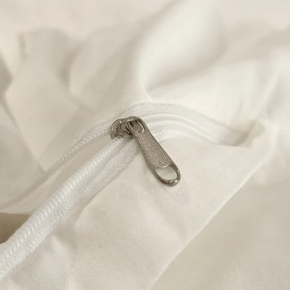 White luxury hotel bedding set by MC THE BLACK DIAMOND with thick brushed bed sheets, showcasing soft, plush bedding for a upscale look.