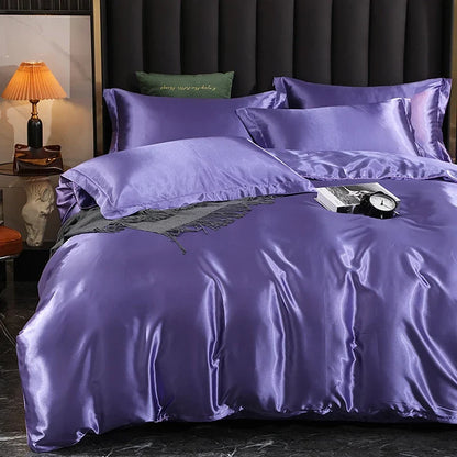 Luxury satin bedding set with fitted sheet and duvet cover by MC THE BLACK DIAMOND, showcasing smooth, elegant home decor.