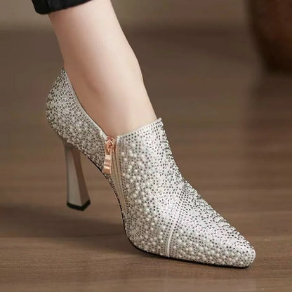 Luxury Mohamamd Collection rhinestone high heels with pointed toes, pearls, crystals, and champagne color for bridal or formal occasions.