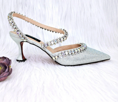 Royal blue MC THE BLACK DIAMOND high heels with metallic drill chain decoration and matching bucket bag for elegant fashion occasions.