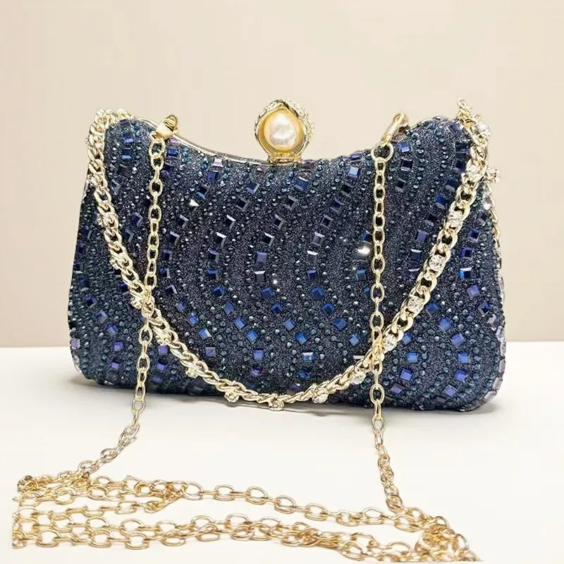 Luxury MC THE BLACK DIAMOND rhinestone diamond inlay evening clutch bag with gold, silver, and blue accents for women’s wedding or party.
