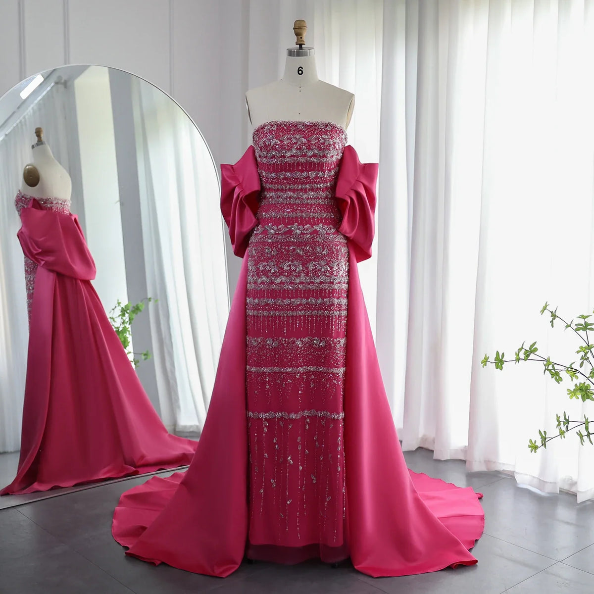 Sage green MC Luxury Dubai evening dress by MC THE BLACK DIAMOND, featuring elegant fabric and a sophisticated design.