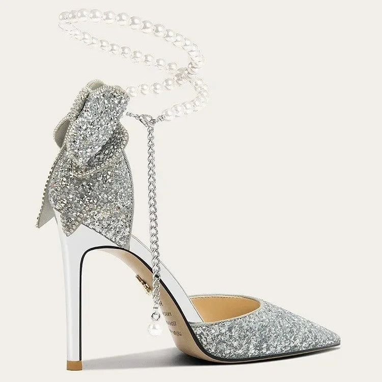 Elegant French pointy high heels from Mohammad Collection with sequin bow, pearl line, and shallow mouth design.