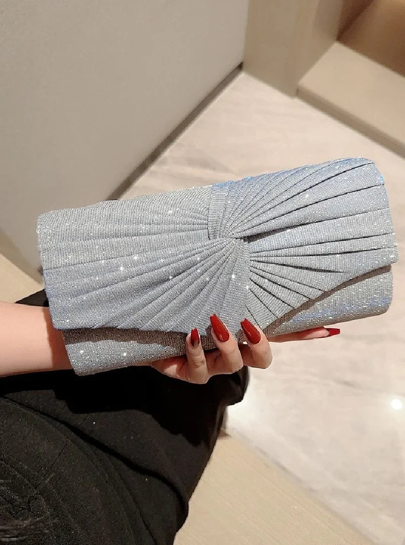 Elegant silver ladies dinner handbag by Mohammad Collection, featuring shining evening design and crossbody style for weddings and parties.
