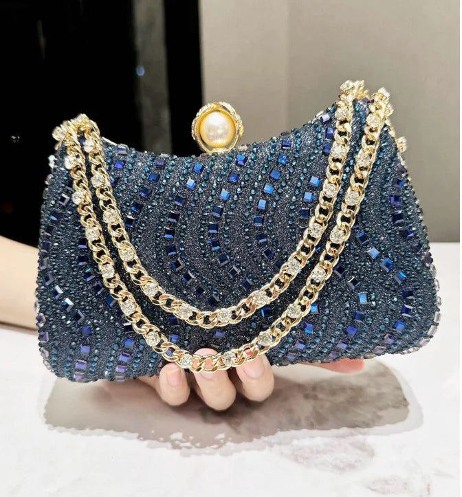 MC THE BLACK DIAMOND rhinestone diamond inlay evening clutch bag with gold, silver, and blue details for women’s wedding or party.