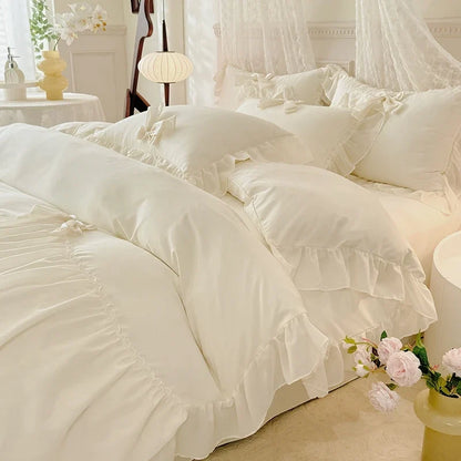 Three-piece white bedding set with ruffled duvet cover by 𝕄𝕋𝕙𝕖 𝔹𝕝𝕒𝕔𝕜 𝔻𝕚𝕒𝕞𝕠𝕟�