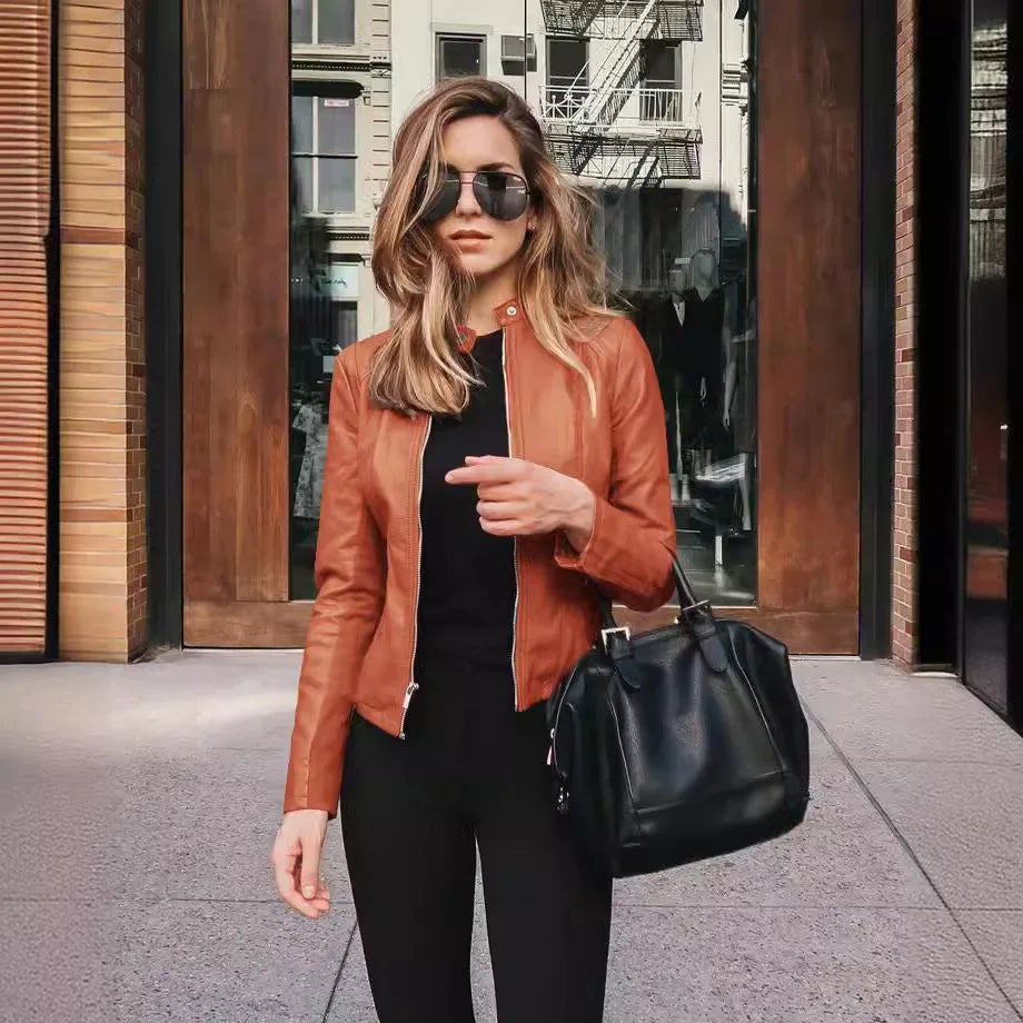 Women’s zipper jacket from Mohammad Collection, featuring a stylish female bag with sleek design and modern details.