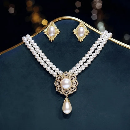 Elegant vintage pearl pendant necklace and matching earrings by 𝕄𝕔 𝕋𝕙𝕖 𝔹𝕝𝕒𝕔𝕜 𝔻𝕚𝕒𝕞𝕠�