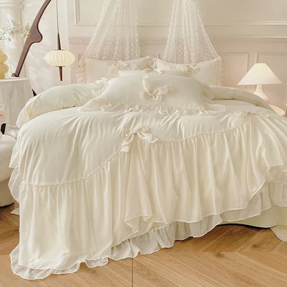 Three-piece white bedding set with ruffled duvet cover and bedsheets from 𝕄𝕔 𝕋𝕙𝕖 𝔹𝕝𝕒𝕔𝕜 𝔻𝕚𝕒𝕞