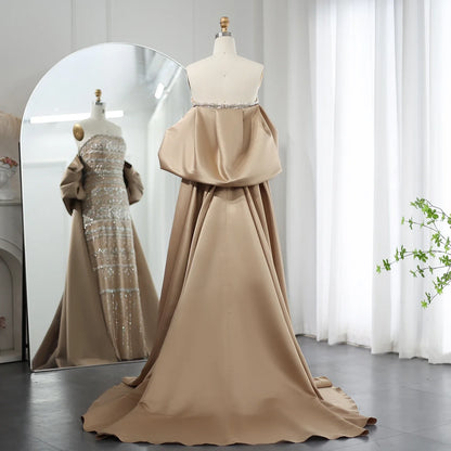 Sage green MC Luxury Dubai evening dress by MC THE BLACK DIAMOND, featuring elegant fabric and intricate design details.