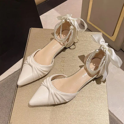 White fairy-style sandals for women with chunky heels, pearl accents, and unique summer design by MC THE BLACK DIAMOND.