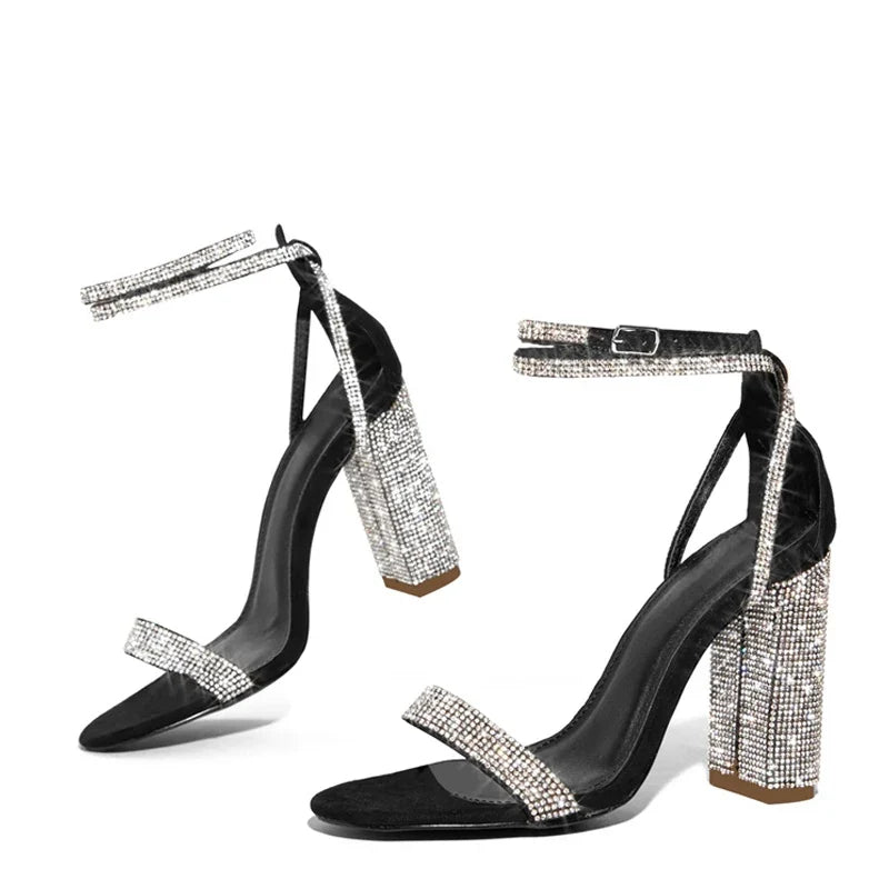 Liyke Fashion glitter rhinestone square high heels sandals from MC The Black Diamonds with sparkling embellishments and a block heel.
