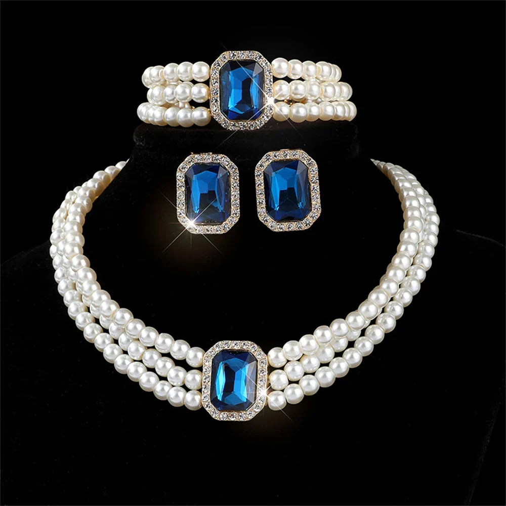 Elegant bridal jewelry set featuring versatile earrings and a matching necklace by MC THE BLACK DIAMOND.