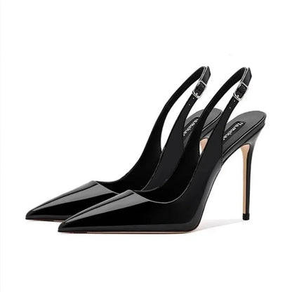 Elegant black patent leather heel sandals with pointed tips and strappy design by MC THE BLACK DIAMOND, perfect for summer parties.