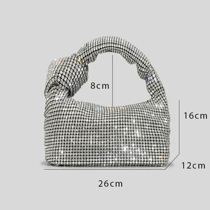 Silver crystal handle evening bag with rhinestone knot design by MC THE BLACK DIAMOND, luxury top handle purse for women.