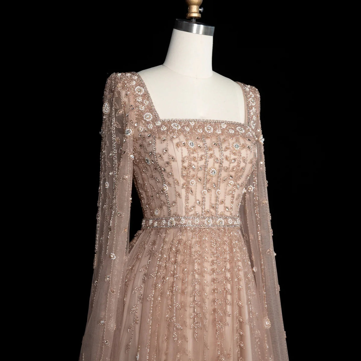 Elegant MC Luxury Pink Dubai Evening Dress by MC THE BLACK DIAMOND, featuring intricate detailing and a flowing silhouette.
