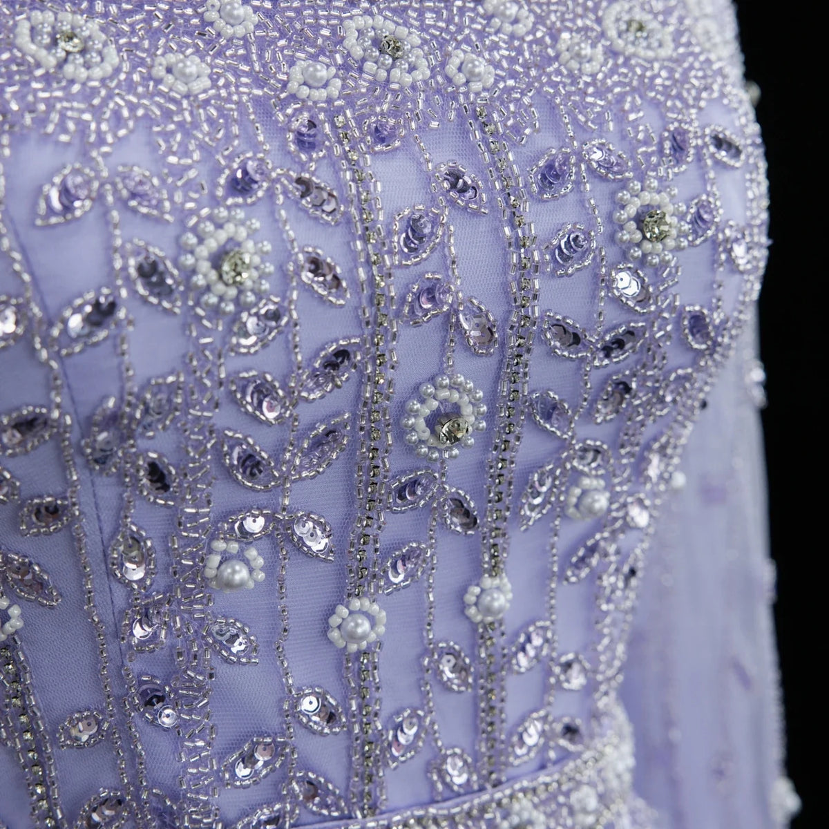 Elegant pink Dubai evening dress by MC THE BLACK DIAMOND featuring intricate details and a flowing silhouette.
