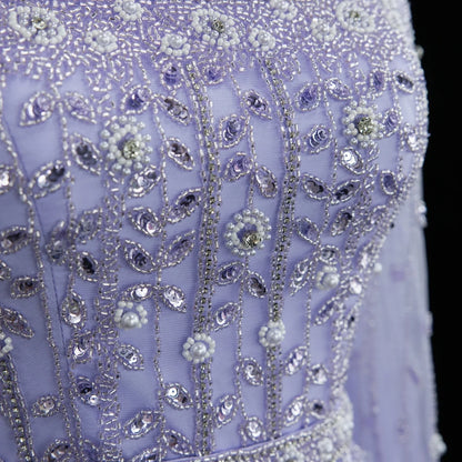 Elegant pink Dubai evening dress by MC THE BLACK DIAMOND featuring intricate details and a flowing silhouette.