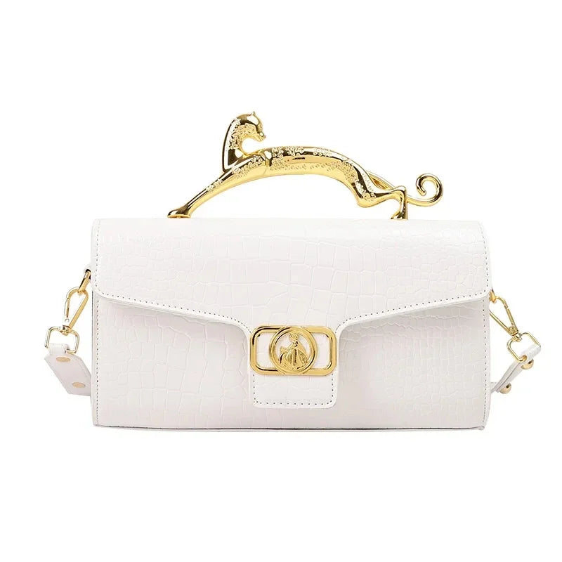 Women luxury leather shoulder bag by MC THE BLACK DIAMOND with metal buckle, simple stylish design, perfect for parties and fashion.